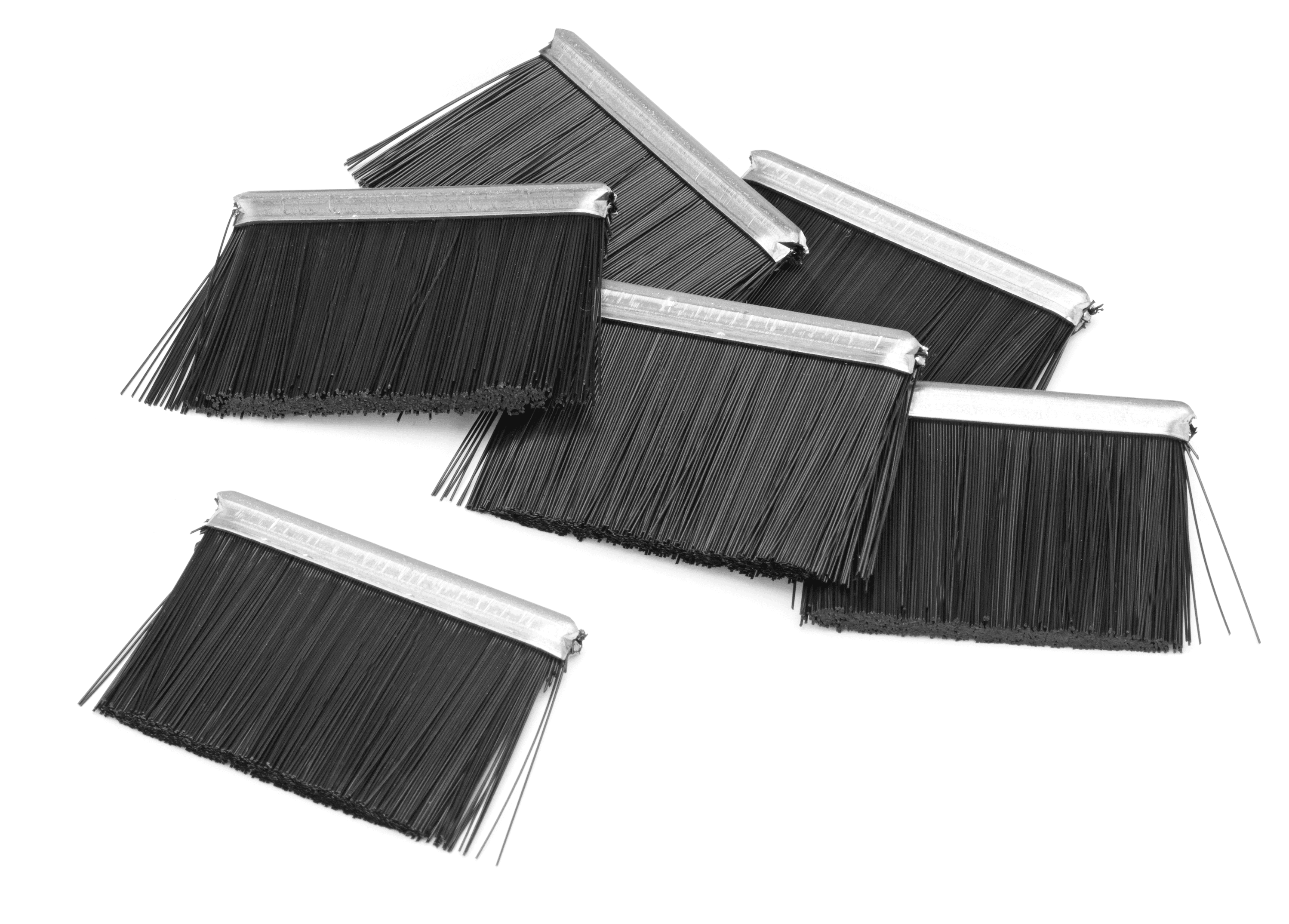 Durable interchangeable poly fiber wheel brushes. Keeps the driving wheels clean from clippings and leaves to maintain improved traction. image